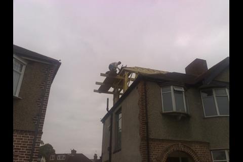 Dangerous builder on a roof